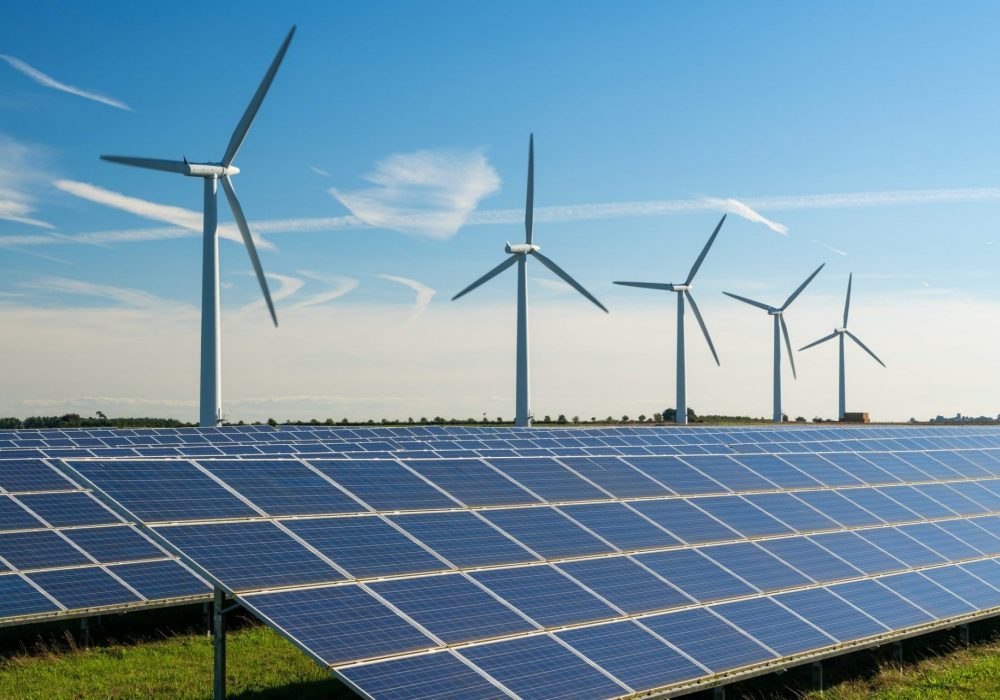 wind-turbine-energy-generaters-on-wind-farm-with-solar-panels-underneath--e1641315546641-piizc3agsxecl4ahpjus0trcdu81uu3cntcic427a0